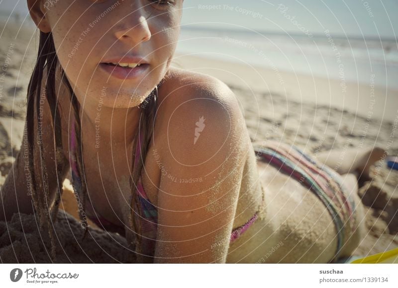 beach day III Child Girl Face Skin Lie Sunbathing Relaxation Vacation & Travel Sand Beach Ocean Water Warmth Bikini