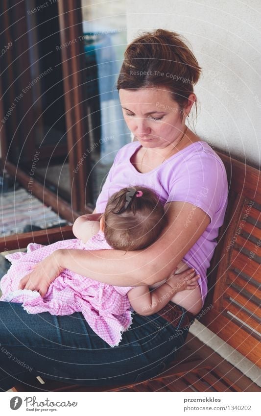 Close-up of mother breastfeeding her little baby on the patio Lifestyle Beautiful Child Human being Baby Girl Woman Adults Mother Family & Relations Infancy 2