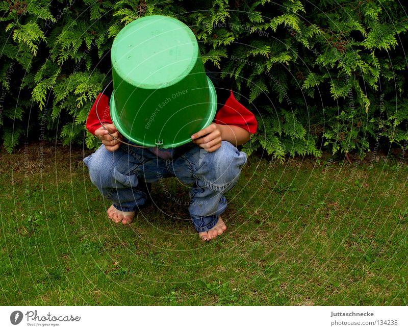 El Torro Boy (child) Child Dress up Bucket Tub Helmet Crazy Playing Headless Grass Meadow Barefoot Communicate lousejunge Hide Mysterious Protection helmeted