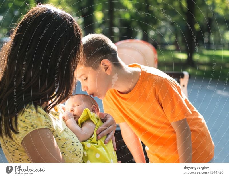 Women, brother and baby in a park. Joy Happy Summer Garden Child Baby Toddler Girl Boy (child) Woman Adults Parents Mother Sister Family & Relations Nature Park
