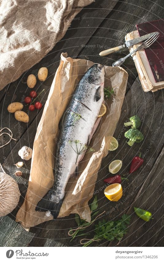 Preparing whole salmon fish for cooking Seafood Vegetable Dinner Table Rope Paper Dark Fresh Delicious Black Cooking Raw vintage healthy mediterranean