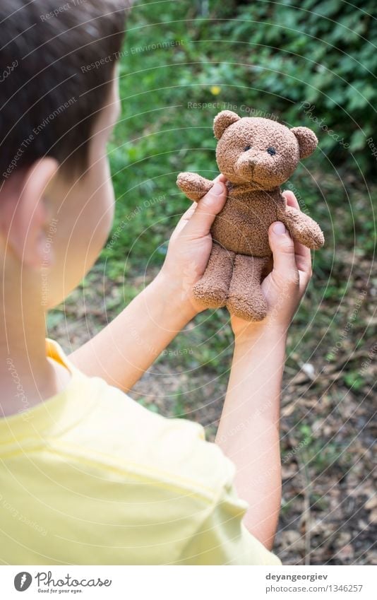 Child hold teddy Playing Baby Girl Boy (child) Infancy Hand Toys Teddy bear Small Brown Bear kid Hold sad young one Portrait photograph