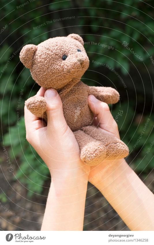 Child hold teddy Playing Baby Girl Boy (child) Infancy Hand Toys Teddy bear Small Brown Bear kid Hold sad young one Portrait photograph