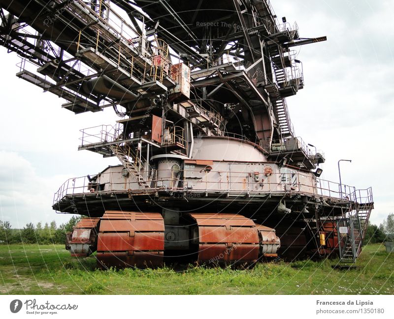 ferropolis Machinery Time machine Soft coal dredger Technology Industry Outdoor festival Deserted Industrial plant Metal Steel Rust Old Gigantic Historic Brown