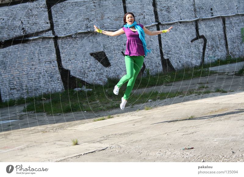 colors are beautiful Multicoloured Green Pants Wall (barrier) Summer Style Backyard Crazy Spontaneous Leisure and hobbies Jump Happiness Good mood Joy