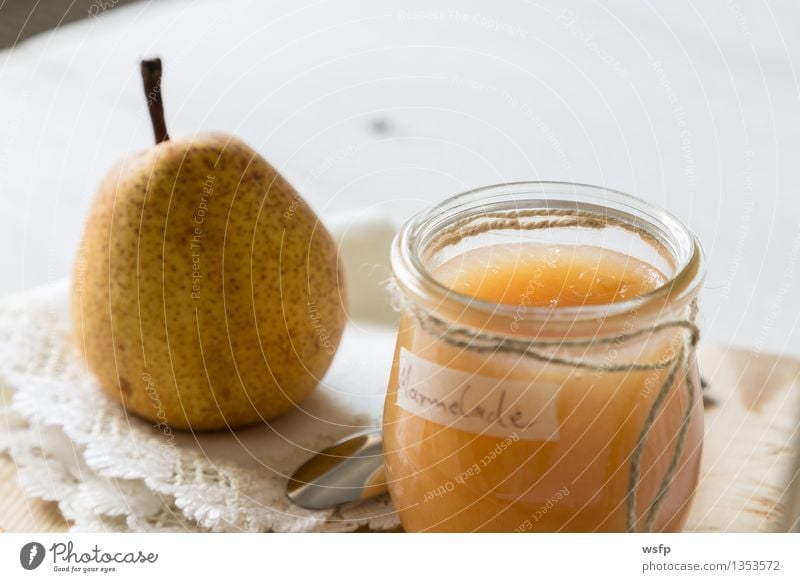 Breakfast with pear jam Fruit Jam Vegetarian diet Diet Cup Spoon String Fresh Pear pears organic Glass Preserving jar Eating Wooden table White wooden table