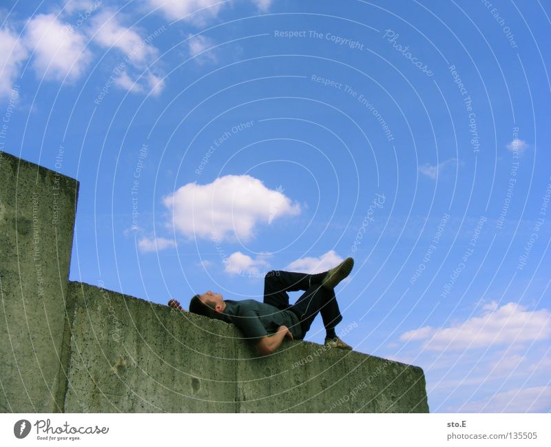 THE WALL | chilled Man Masculine Youth (Young adults) Fellow Posture Goof off Rest To enjoy Calm Relaxation Clouds Bad weather Summer Wall (barrier)