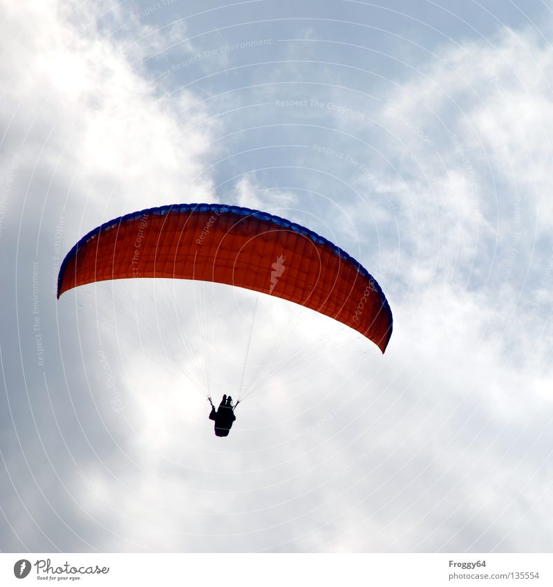 up and away Paraglider Air Clouds Pilot Black Schauinsland Bird Black Forest Leisure and hobbies Sports Playing Aviation Sky Blue Orange Wind Weather Mountain