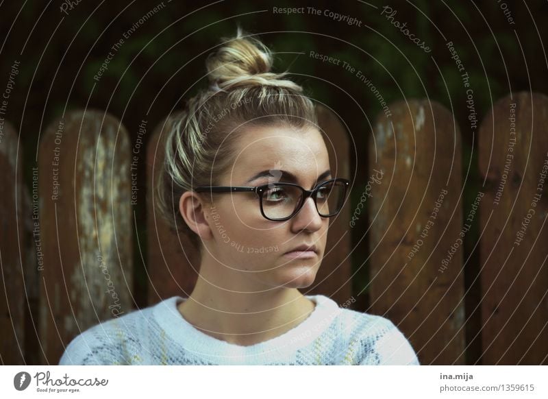 young woman with bun and glasses Human being Feminine Young woman Youth (Young adults) Woman Adults Life Face 1 18 - 30 years Fashion Clothing Accessory
