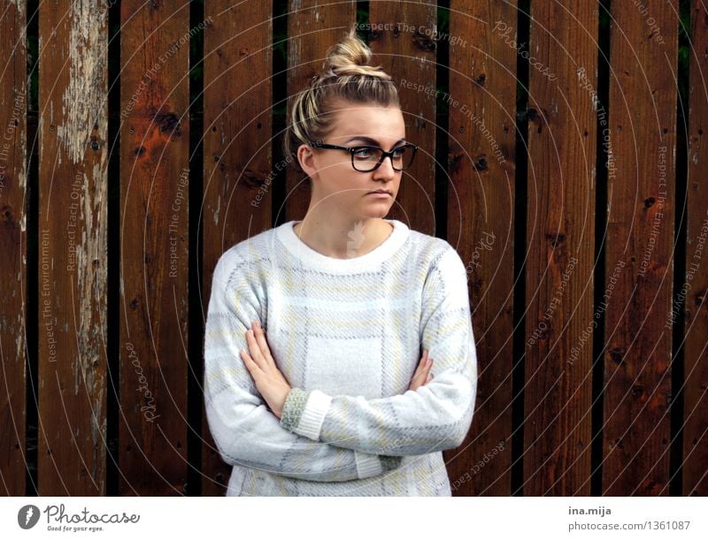 young woman with glasses and bun has her arms crossed Human being Feminine Young woman Youth (Young adults) Woman Adults Life Face 1 18 - 30 years 30 - 45 years