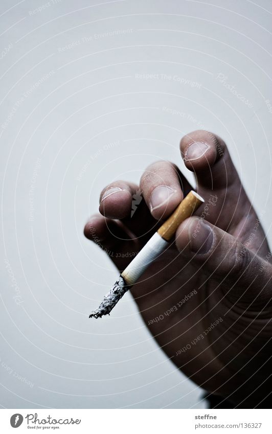 I'll get a cigarette. Cigarette Smoke Unhealthy Harmful Smoking Hand Fingers Man Odor Malodorous Men`s hand Filter-tipped cigarette Bright background