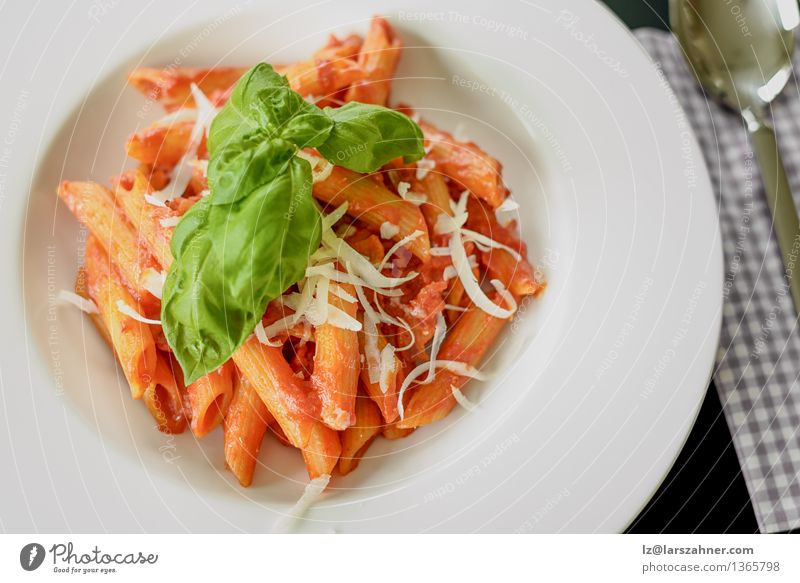 Plate of penne pasta with arrabiata sauce Cheese Herbs and spices Nutrition Lunch Fork Spoon Kitchen Restaurant Leaf Hot Delicious Leisure and hobbies Tradition