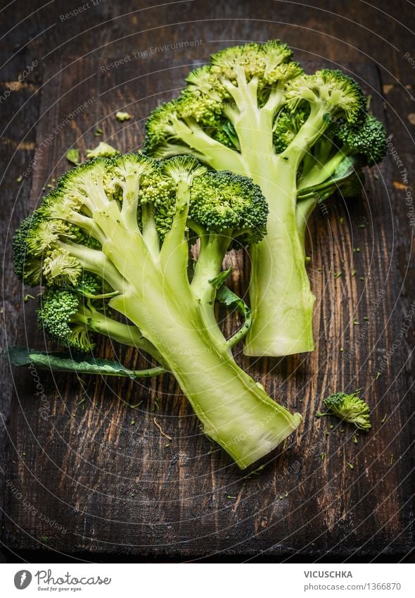 Broccoli on dark rustic wood Food Vegetable Nutrition Organic produce Vegetarian diet Diet Healthy Eating Life Table Design Style Vegan diet Dark Wooden table