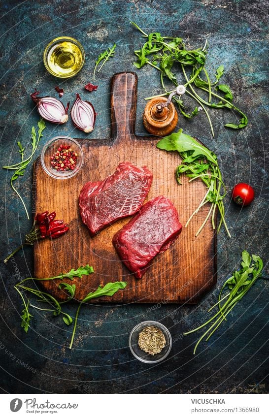 Delicious beef steak on cutting board with fresh ingredients Food Meat Vegetable Lettuce Salad Herbs and spices Cooking oil Nutrition Lunch Dinner Buffet Brunch