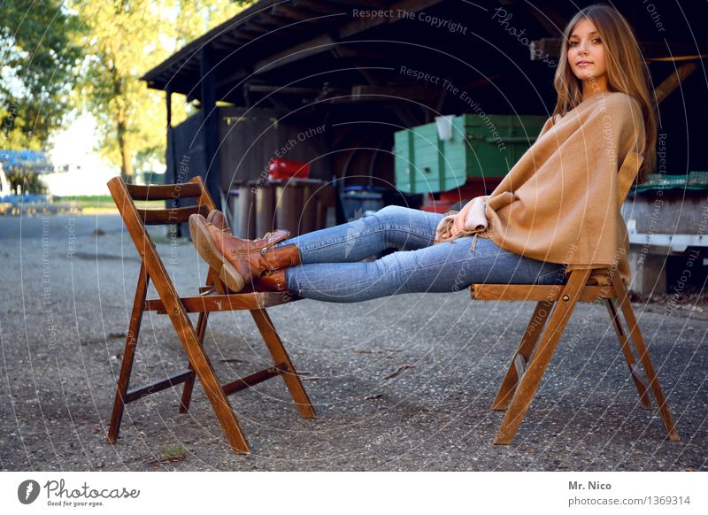 Girl from the country Feminine 1 Human being 18 - 30 years Youth (Young adults) Adults Jeans Boots Long-haired Sit Wait Beautiful Contentment Chair Farm Rural