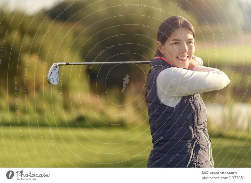 Smilling friendly young woman golfing Lifestyle Happy Relaxation Playing Summer Club Disco Sports Golf Woman Adults Autumn Smiling Friendliness Green