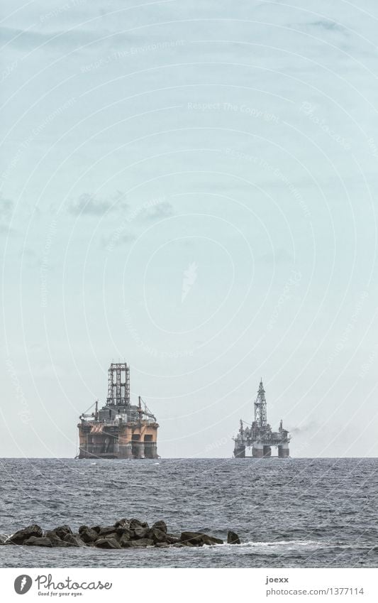 drills Technology Energy industry Sky Clouds Horizon Ocean Hideous Blue Yellow Gray Sustainability Drilling rig Oil production Colour photo Subdued colour