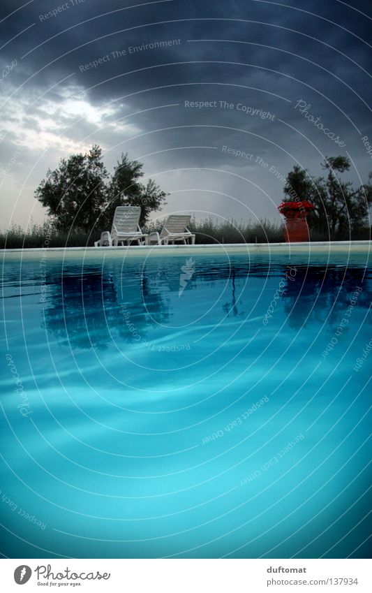 Blue hour Relaxation Calm Swimming pool Waves Dive Water Sky Clouds Bad weather Gale Rain Thunder and lightning Passion Tuscany Couch Deep Copy Space bottom