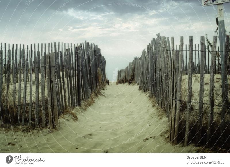 A fence in France Beach South Vacation & Travel Fence Clouds Narrow Sand Cover Lanes & trails holiday
