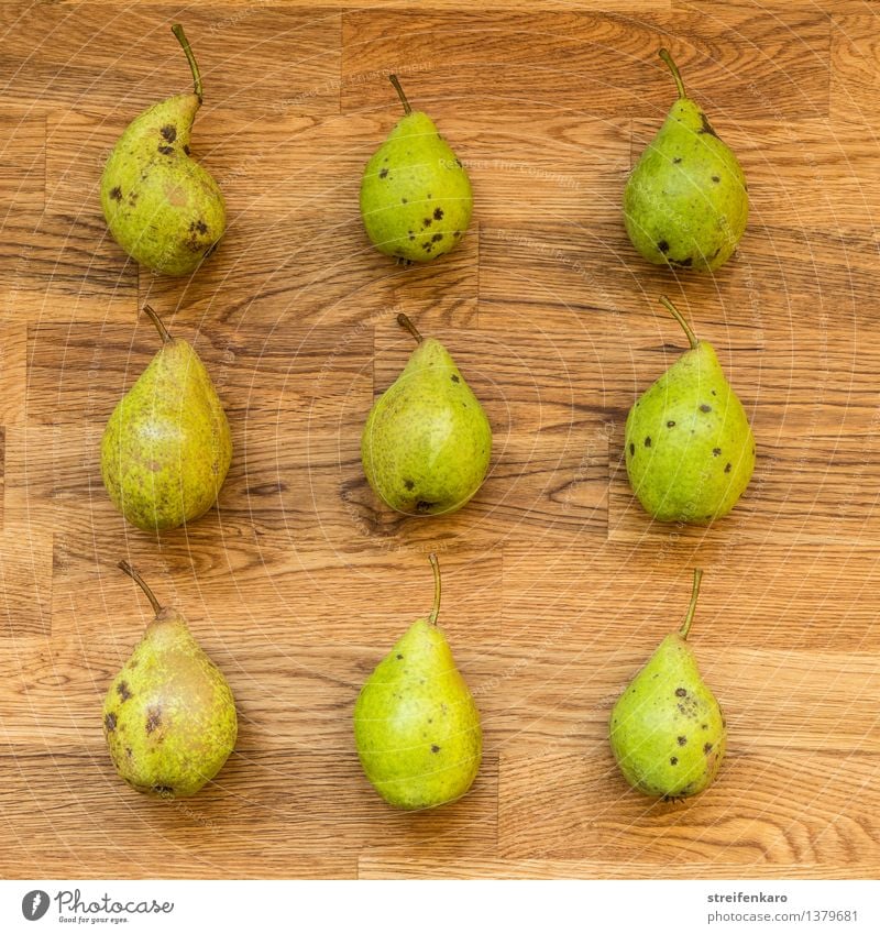 Nine pears, regularly arranged on a wooden table Food Fruit Pear Nutrition Eating Organic produce Vegetarian diet Diet Slow food Healthy Kitchen Thanksgiving