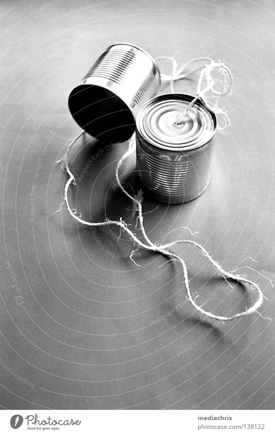 can communication Telephone Tin Computer network Toys Media Net Cable Black & white photo canned telephone