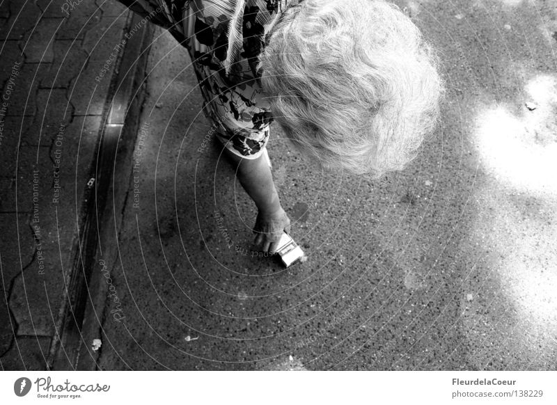 cigarettes sur la rue Cigarette Senior citizen Stoop Lift Sidewalk Bird's-eye view Human being Street Female senior Black & white photo