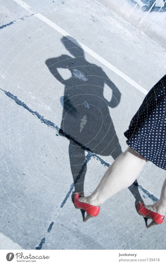 When the lights go out, I'll be alone again. Woman Concrete Silhouette Crime scene Criminality High heels Dress Red Abstract Light Parking lot Obscure Shadow