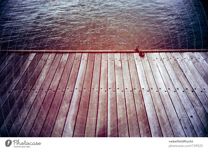 footbridge Footbridge Wood Wooden board Ocean Lake Summer Watercraft Drop anchor Anchor Moody Vacation & Travel Red Retro Cold Physics Lomography Vignetting