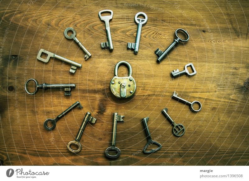 Classified information: Different keys arranged in a circle around a curtain - Lock Security force Safety Padlock Key Technology Keyhole Collection Brown Yellow