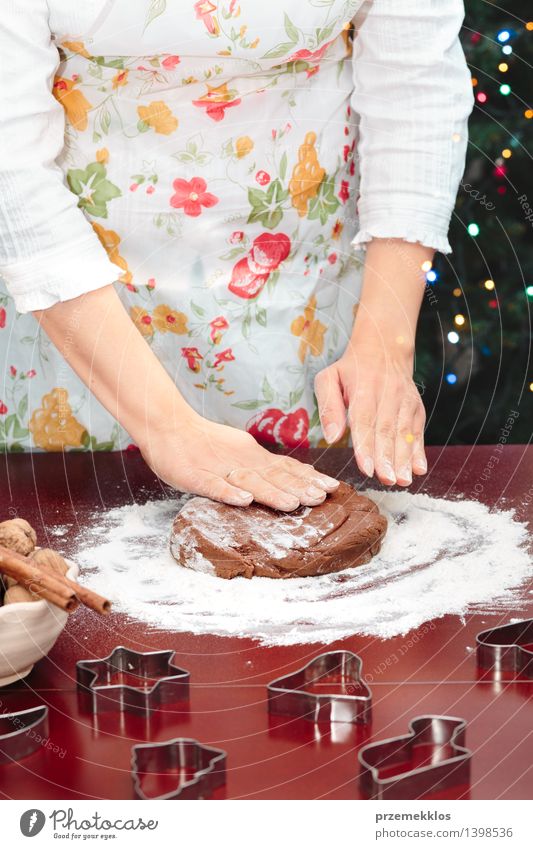 Woman making dough for a Christmas cookies Table Kitchen Human being Adults Hand 1 30 - 45 years Make Flour Gingerbread Home-made Preparation Colour photo