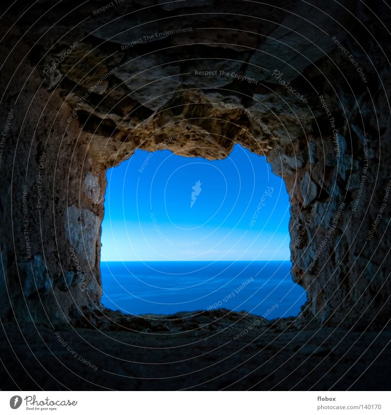 Light at the end of the tunnel... Ocean Vantage point Blue Lake Sky Water Waves Horizon Far-off places Hollow Window Fortress Penitentiary Captured Loneliness