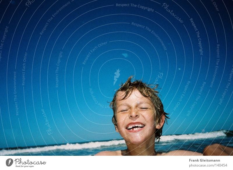 joy Joy Ocean Blue Vacation & Travel Boy (child) Laughter Child Waves Wet Cold North Sea Happy Beautiful weather Dazzling white teeth Swimming & Bathing White