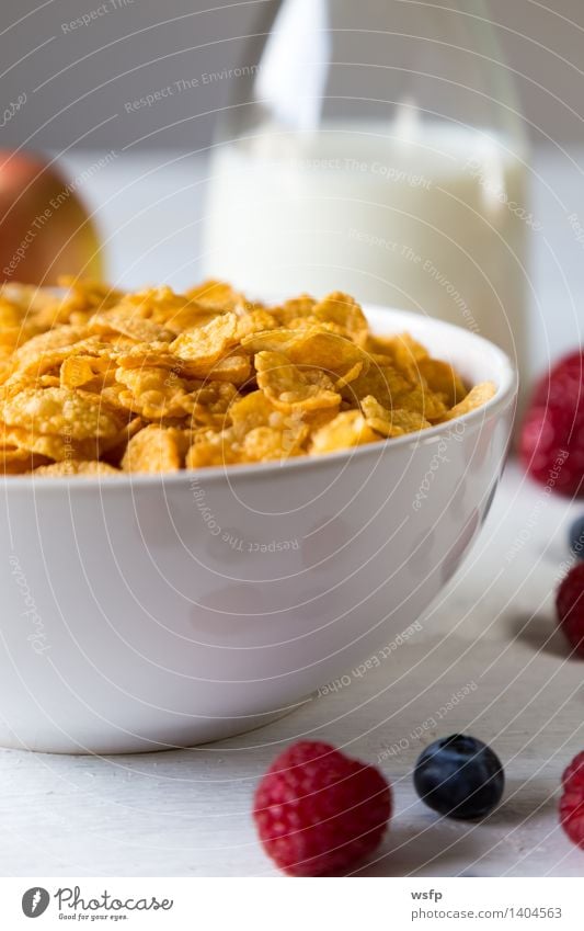 Cornflakes in a bowl Fruit Apple Breakfast Milk Bowl Wood breakfast cereals Flake Blueberry Cereals raspberry Strawberry Grain Eating shell Bright background
