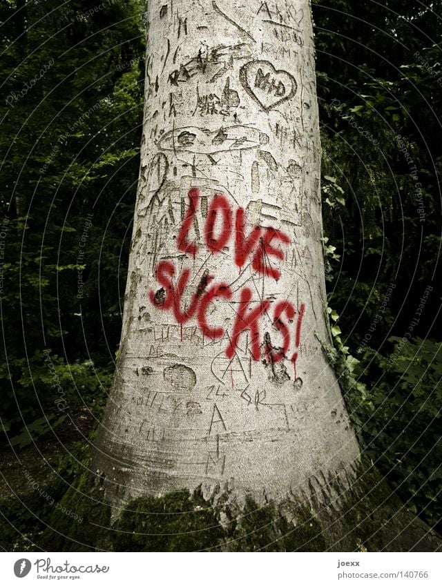 LOVE SUCKS! Tree Sign Characters Graffiti Heart Love Anger Brown Red Black Emotions Sadness Lovesickness Disappointment Loneliness Distress Aggravation