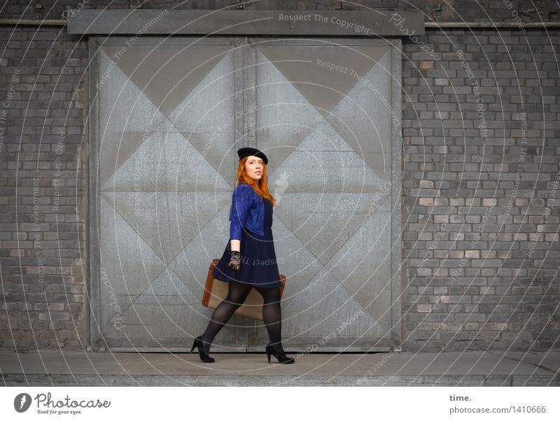 . Feminine 1 Human being Wall (barrier) Wall (building) Gate Dress Jacket Suitcase Gloves Cap Red-haired Long-haired Observe Going Vacation & Travel Looking