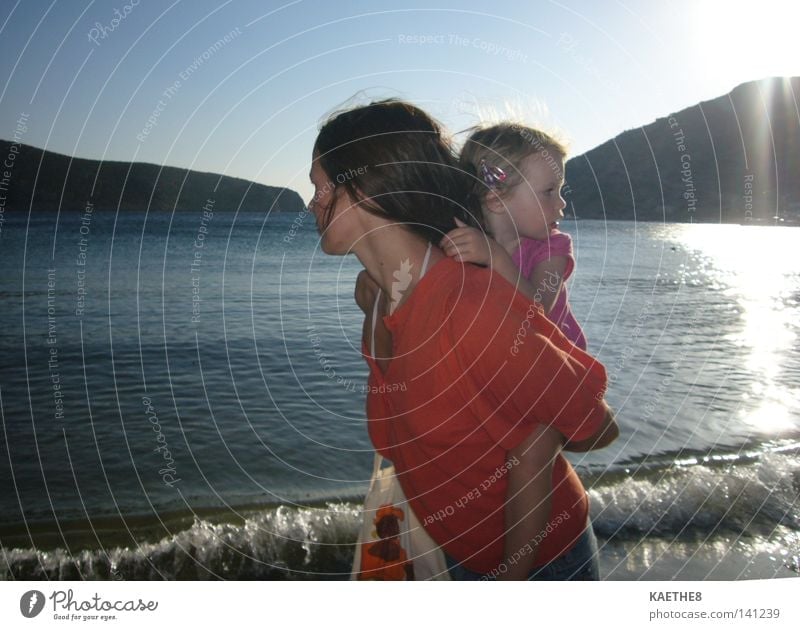 The two of us Summer Woman Child Mother Daughter Intimacy Ocean Sunset Vacation & Travel Leisure and hobbies Calm Trust Family & Relations Waves Light Beach