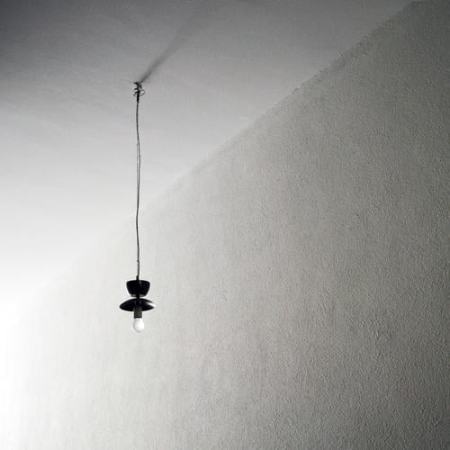 one Interior design Energy industry Bright Electric bulb Lamp Lighting Hang Old building Cable Long Minimalistic Loneliness Black & white photo Interior shot