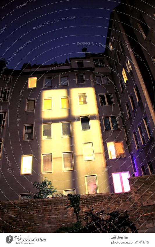 Window to the night Facade House (Residential Structure) Backyard Town house (City: Block of flats) Window transom and mullion Night Night light Light