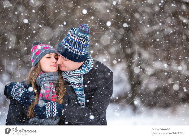Loving couple in the winter park. Lifestyle Winter Snow Winter vacation Mountain Hiking Valentine's Day Masculine Feminine Woman Adults Man Youth (Young adults)