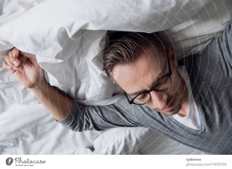 a little tired Bed Bedroom Human being Young man Youth (Young adults) Life 18 - 30 years Adults Eyeglasses Contentment Relaxation Leisure and hobbies Serene