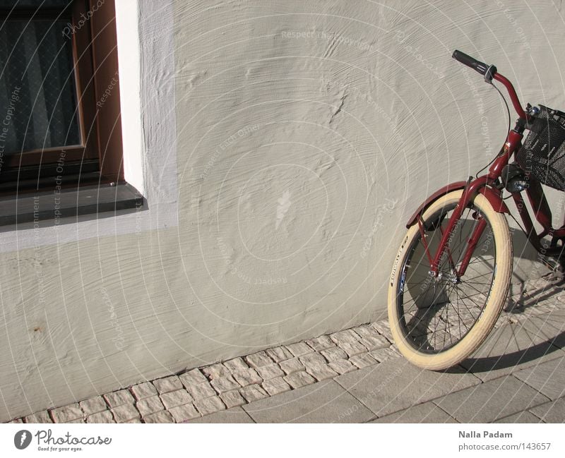 parking position Colour photo Exterior shot Deserted Day Shadow Deep depth of field Bicycle Wall (barrier) Wall (building) Window Transport Bright Hip & trendy