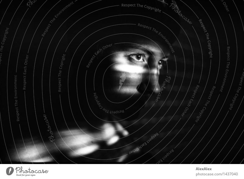 900 | black and white image of a young woman looking out in grazing light illuminated by a blind Young woman Youth (Young adults) Eyes 18 - 30 years Adults
