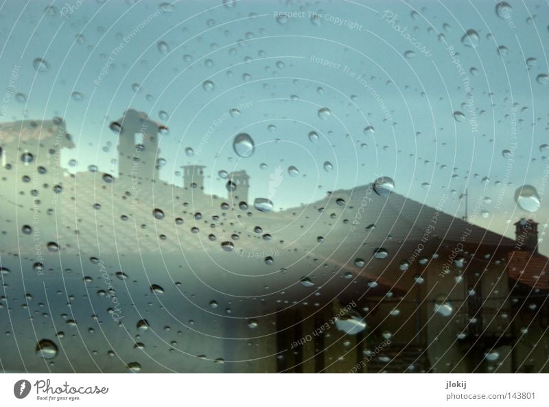Whenever it rains... Rain Drops of water Round Wet Weather Window pane Car Window Slice Transparent Fog Movement Double exposure House (Residential Structure)