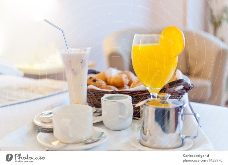 # 1438976 Dairy Products Breakfast Juice Milk Coffee Plate Mug Glass Juicy Orange Hotel Resort Horizontal Colour photo Interior shot Deserted Morning