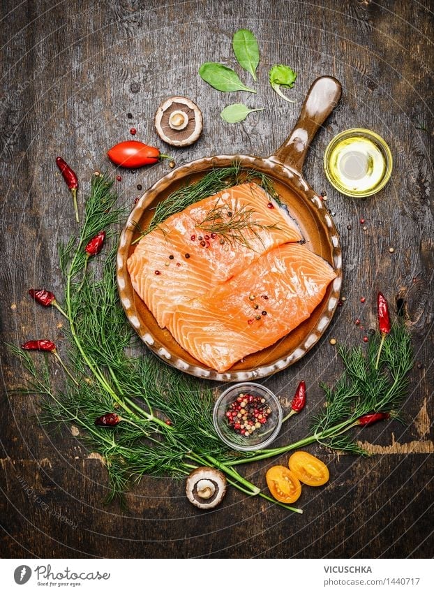 Salmon fillet with herbs in an old frying pan Food Fish Vegetable Herbs and spices Cooking oil Nutrition Lunch Dinner Buffet Brunch Banquet Organic produce