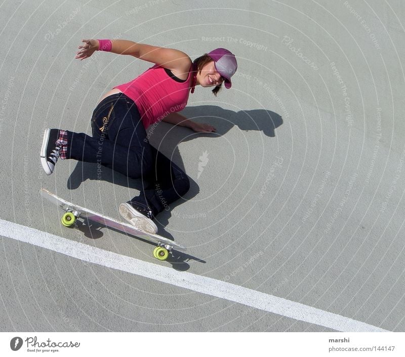 Skater Girl Skateboarding Swing Leisure and hobbies Pink Style Kick Sports Body control Concrete Street art Emotions Grinning Joy skateboarder Wooden board