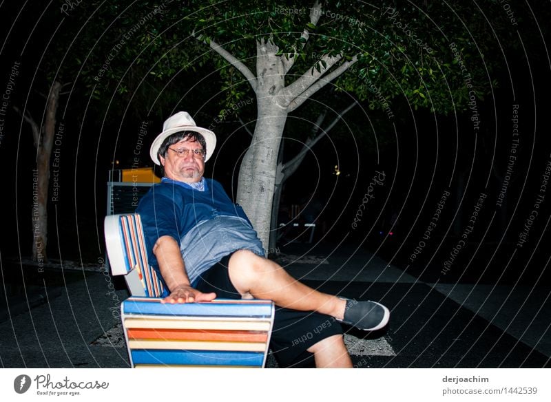 I am angry, older man with hat and glasses sits on a colourful bench in the evening,, Joy Life Leisure and hobbies Trip Summer Feasts & Celebrations