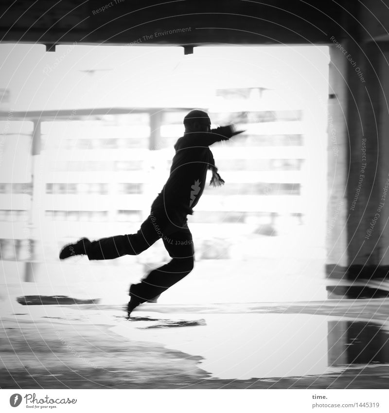 Flyin' Jo Masculine 1 Human being Water Puddle High-rise Wall (barrier) Wall (building) Facade Column Flying Walking Jump Dance Romp Athletic Town Joy Euphoria