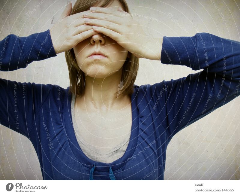 Shy Portrait photograph Hand Timidity Woman hands face Blue keep an eye out shy Hide
