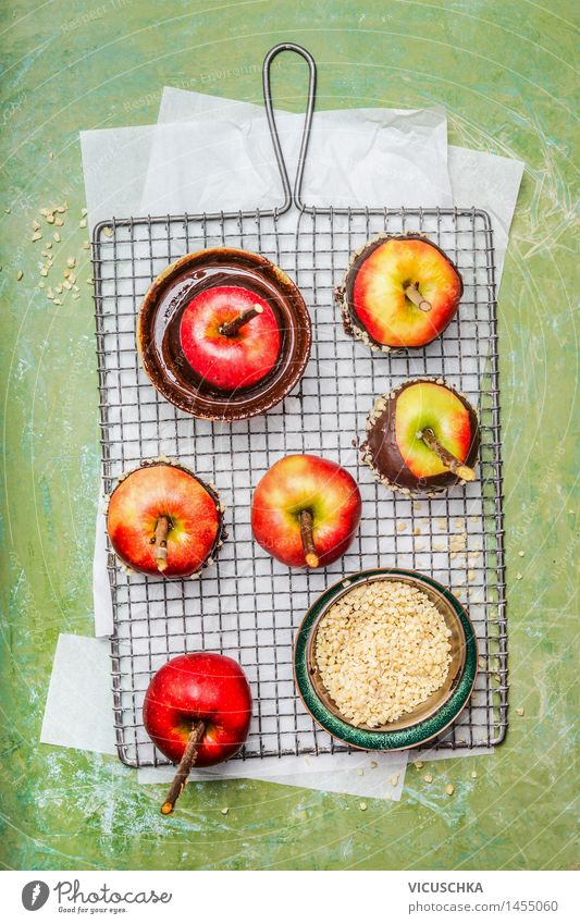 Red apples, melted chocolate and chopped almonds Food Fruit Apple Dessert Candy Chocolate Nutrition Banquet Bowl Style Design Joy Healthy Eating Life Table